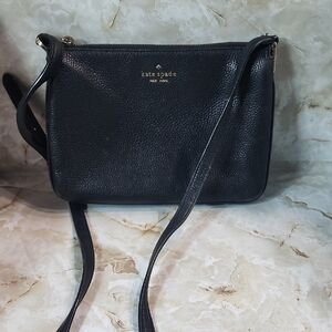 Kate Spade Leila Triple Gusset crossbody bag in black pebbled leather. 